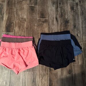 Women’s Nike 3 inch lined shorts. 7 pair size large